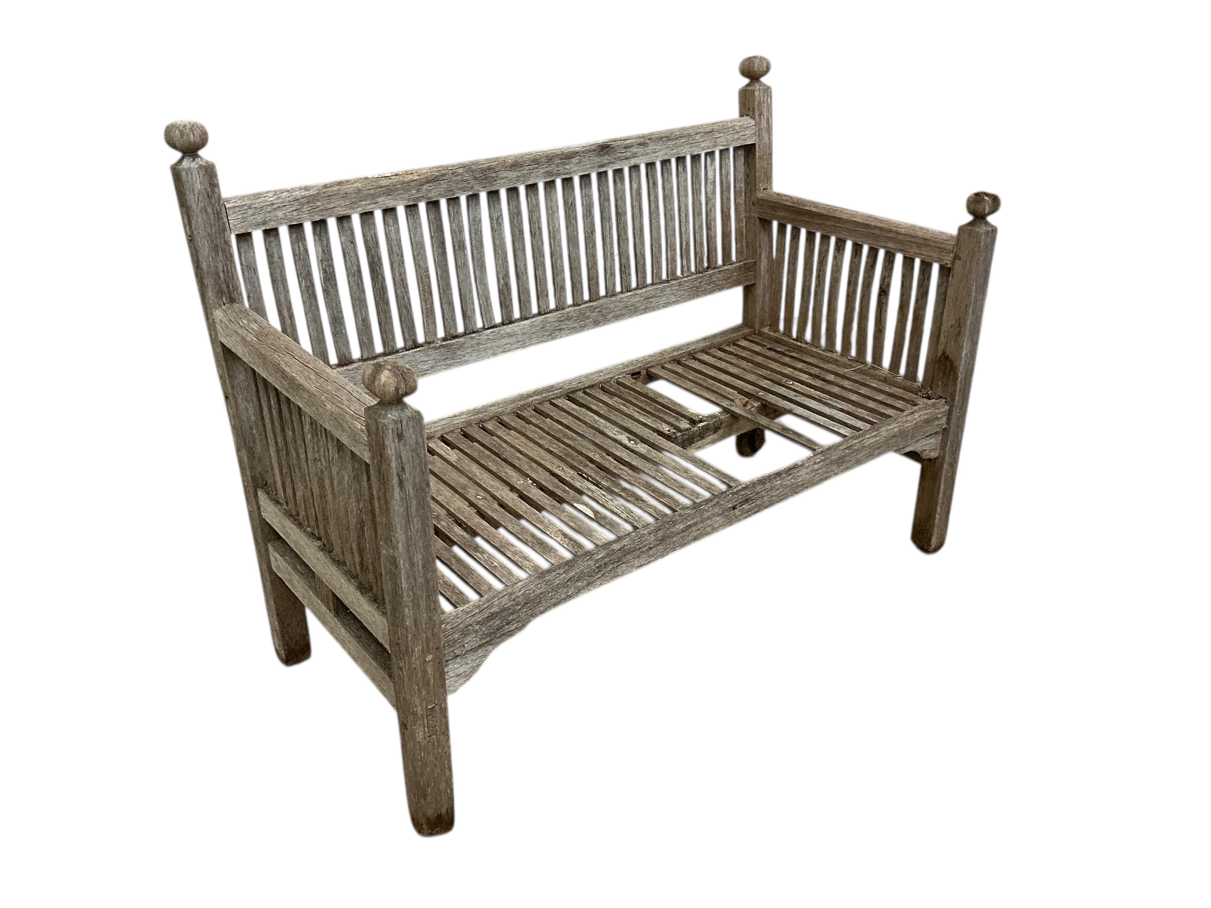 A Heals weathered teak garden bench, width 114cm, depth 56cm, height 84cm